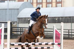 Mag Ross on Chester enjoying jumping in Knockagh View's fantastic all-weather outdoor Arena giving a full selection of showjumps and a top SJI course designer each week.