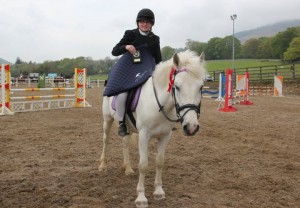 Grey Sapphire, this time with Tierna Harper in the 80cm class was in great form collecting his third class win at Ravensdale Lodge's "Bumper Show" on Monday 5th May. Photo: Niall Connolly.