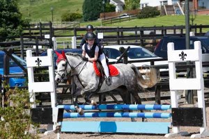 Ellie Nesbitt and Suzie jumping well in the 60cm class at the all money league: Photo AP photography