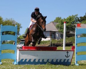 Johnny Mulligan, seen here jumping the "joker" fence with Wonder, had a busy day at the Moorhill Saddlery cross-jump series at Ravensdale Lodge on Sunday going clear on three of his five entries and drawing the lucky rosette to win the signature Ravensdale Lodge saddle pad for the class Photo: Niall Connolly