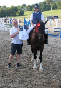 Warrenpoint, Co. Down rider Sinead young had a great evening at Ravensdale Lodge on Friday evening picking up the league and final titles of both the 80cm & 90cm competitions on Jacobi in the horse & pony training league. Sinead is seen here with Jacobi and her father Michael with her haul of prizes. Photo: Niall Connolly.