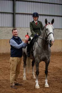 Kirsty Marsden and Loughmorne Diamond being presented their trophy for winning the ridden horse class by judge Shane Belton, Photo: AP Photography