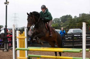 Jo McGrath and California Clover jumping in the 90cm class at Knockagh View's All Silver fun day Photo: AP Photography