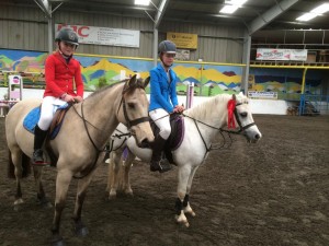 Winners of the 60 cm class left to right 2nd place Chloe Connon on River Island Turbo, 1st place Jodie Creighton on Monarch