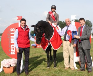 2014 Connolly's RED MILLS Munster Grand Prix Champion Francis Connors pictured with from left John Geraghty from RED MILLS, Tony Hurley ShowjumpingIreland Chairman and Gareth Connolly of Connolly'