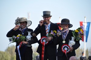 (centre) Wilbrord van den Broek (NED) won individual gold at the FEI World Single Driving Championships 2014 in Izsák (HUN) with Germany’s Claudia Lauterbach taking silver (left) and compatriot Marlen Fallak claiming bronze. (Claudia Spitz/FEI).