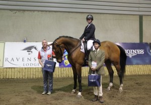 Clare Murtagh & Mia were the winners of the class 4 league and final at Ravensdale Lodges recent dressage league final. Clare is seen here with second placed Elaine Martin being presented with their prizes from judge David Patterson. Photo: Niall Connolly.