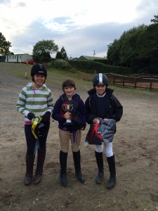  Winners of 60cm Class (from left) 3rd India Bloomfield, 2nd and winner of “The Brian Kerr Memorial Cup 2014” Keva Milligan, 1st Becky McBride on Calie Lily