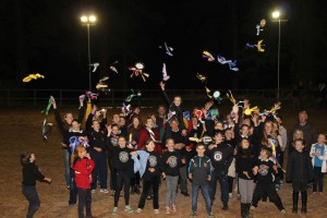 Prize winners celebrating the switching on of the new lights