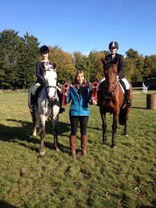 Laoise O'Farrell, winner of the 1m Pony Working Hunter and Beth Cunningham winner of the 1m Horse Working Hunter with judge Phillipa Auret.