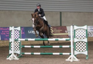 John Floody steers Sheikh Samir Mirdad's Mirdad's Hawa to clear rounds in both the 1.20m & 1.30m classes at Ravensdale Lodge's SJI registered horse league on Thursday. Photo: Niall Connolly.