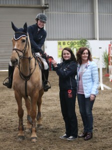 Aoife Kelyy and Carte d'Or winners of the 1.20m class sponsored by McCaughey  24Hr Service Station. Presentation by Margaret & Aedi McCaughey