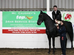 Connor McEneaney and Moonlite Cavalier winners of the 1.30m class sponsored by McCaughey 24Hr Service Station.