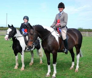 Coloured Champions, L to R, Cora McNulty and "Chief" (Reserve) and Karina McVeigh with "Midnight Reflection" (Champion)