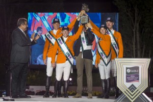The Netherlands’ team celebrate victory in the Furusiyya FEI Nations Cup™ Jumping 2014 Final in Barcelona, Spain tonight. (L to R), HRH Prince Faisal of Saudi Arabia and Dutch team members Jeroen Dubbeldam, Gerco Schroder, Chef d’Equipe Rob Ehrens, Maikel van der Vleuten and Jur Vrieling. (FEI/Dirk Caremans)