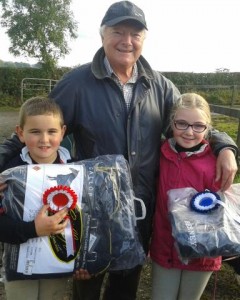 Tommy Caves with Timothy Mcnabney, 1st in the 50cm and his granddaughter Jessica Mark 2nd