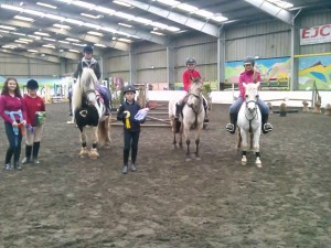Right to left prize winners of 60 cm class Jodie Creighton, Chloe Connon, Adam Sossick, Charlene Smith, Lucy McPeake, Sophie McPeake
