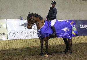 Davis Griffin & Craigmore Hughie pose after being presented with their Ravensdale Lodge rug after their name was picked from the draw of all entries into Sunday's "Bumper Christmas Show" at Ravensdale Lodge. Photo: Niall Connolly.