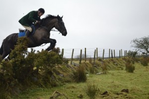Hunt Master Philip White clearing the hedge