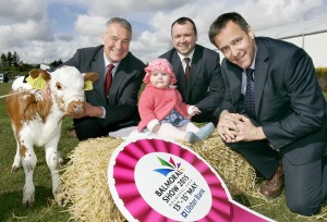 Cormac McKervy and Andy Mills from Ulster Bank with RUAS Colin McDonald and six month old Nancy at the launch of the 147th Balmoral Show.