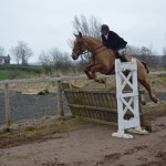 Brendan Gormley on Dermott in flight over the gallop fence