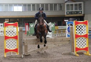 Over the joker we go! Jenna Johnston & Rossi clocked up a maximum three points by going clear with the joker fence in the 85cm class at Ravensdale Lodge's indoor arena eventing league on Saturday afternoon. Photo: Niall Connolly.