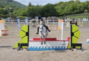 Annie Kavanagh & Kilpatrick Cascade jump the joker fence in the 85cm class at Ravensdale Lodge's arena eventing league on Saturday afternoon. Photo: Niall Connolly.