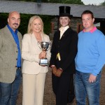 From left June Ormedilla, Victoria Ormedilla, Michael Murray
presenting The Lagan Construction Perpetual Challenge Cup for The Supreme
Hunter Champion of  the Show to Joan Cunningham (Show Director) also
included Megan Hamil.