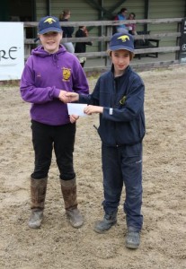 "Lucky winner"!: Jack Cowden from the Mourneview Riding Club is presented with his tickets for the RDS Dublin Horse Show by Jason Connolly of Ravensdale Lodge after his name was drawn from the hat at the centres "Bumper" RDS ticket show on Sunday. Photo: Niall Connolly. 