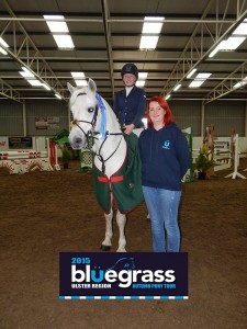 1st in the 138 Grand Prix Aisling McGuinness on Cider Girl. Sponored by Walter Russell.Presentation by Bluegrass rep Chloe Hoyle.