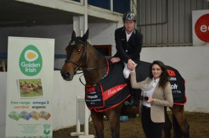 Sean Kavanagh 1st and 4th in the 1.20m class sponsored by McCaughey 24Hr Top Service Station. Presentation by Ellen Kernan.