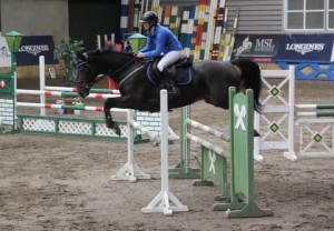  Tara Dunne & Freddie C in action over the 1.10m track at Ravensdale Lodge's SJI registered horse league on Thursday afternoon. Photo: Niall Connolly. 