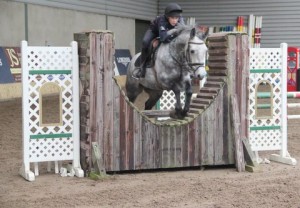 Harry Haire & Gunner put in a lovely jump over the "joker" fence in the 85cm class at Ravensdale Lodge's indoor arena eventing league on Saturday afternoon. Photo: Niall Connolly.